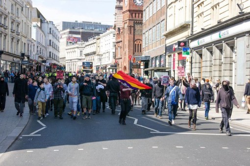 This was not the victory march I'm talking about, there must have been two! - Here young people are celebrating with the flag of the International Brigades from the Spannish Civil war