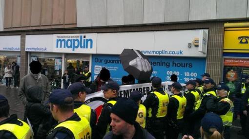 Some of the assembled antifascists give the EDL a hard time.