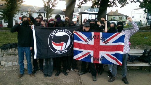 Brighton Antifascists display the fascist flag they took off some far-right idiot.